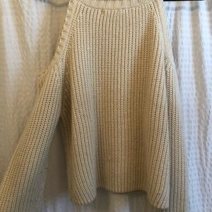 Cream colored, stylish sweater